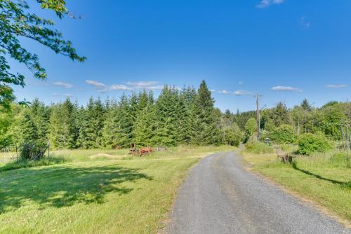 Rainier Home on 20 Acres with Blueberry Farm!