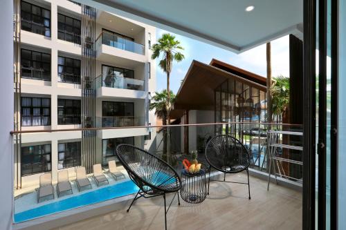 Balcony/terrace, Palmyrah Surin Beach Residence  in Surin