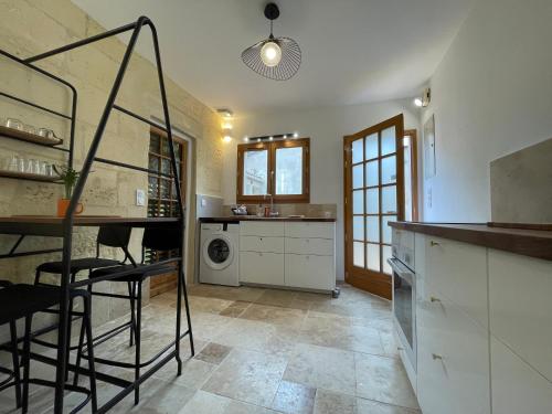 Appartement cosy avec cuisine équipée et terrasse ensoleillée