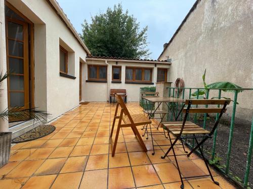 Appartement cosy avec cuisine équipée et terrasse ensoleillée