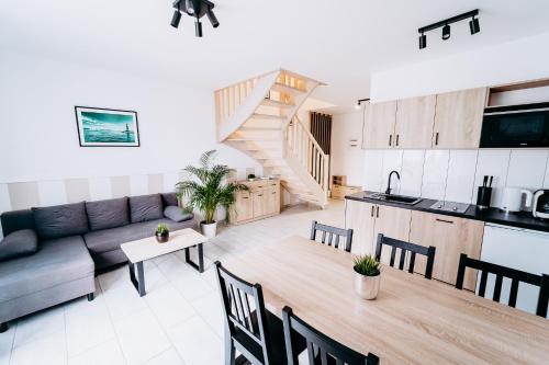 Nadmorska Przystan Apartamenty - Basen, sala zabaw, rowery, animacje