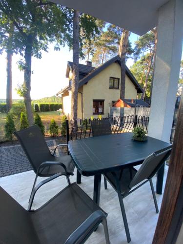 Luksusowy domek letniskowy z widokiem na jezioro, 8 osób Kamionki Małe (Luksusowy domek letniskowy z widokiem na jezioro, 8 osob Kamionki Male) in Turzno