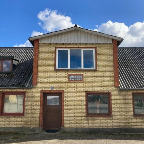 Vista exterior, Døssinghus Holiday Apartments in Kjellerup