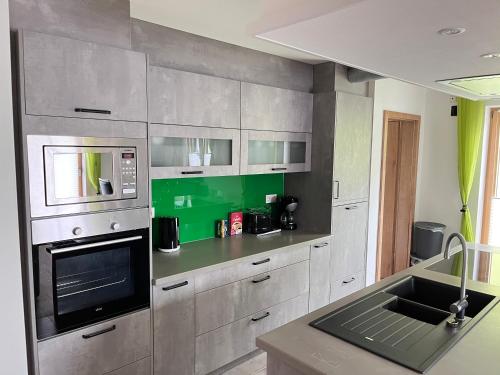 Konyha, Ferienwohnung beim Mane in Halfing