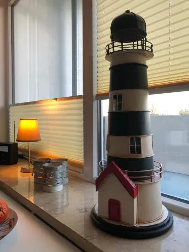 Ferienwohnung Sandküste mit Strandkorb & Indoor Spielplatz in Heiligenhafen, Deutschland