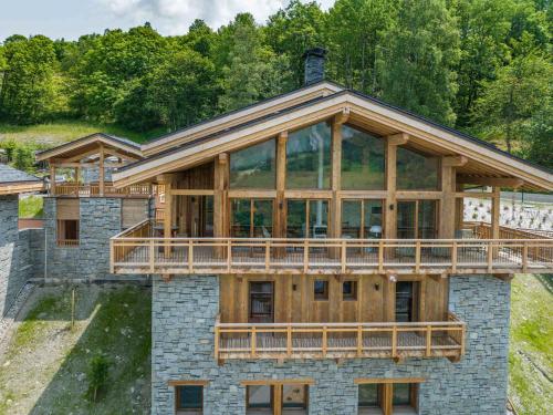 Chalet Neuf avec Sauna a 100m des Pistes, Accueillant jusqu'a 12 personnes et Acceptant les Animaux  in Saint-Marcel