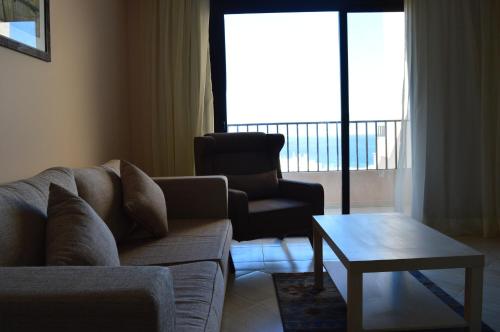 Sky View Suites Hotel Room Type - Deluxe Double Room with Side Sea View