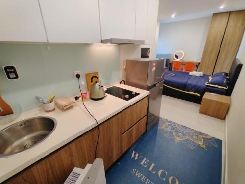 Kozi Square Studio Room Type - One-Bedroom Apartment
