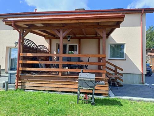 Instalações, Apartament nad jeziorem in Nadole