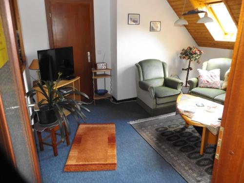 Koplietošanas atpūtas telpa ar TV, Gästehaus Hahnenkrug (Gastehaus Hahnenkrug) in Selk