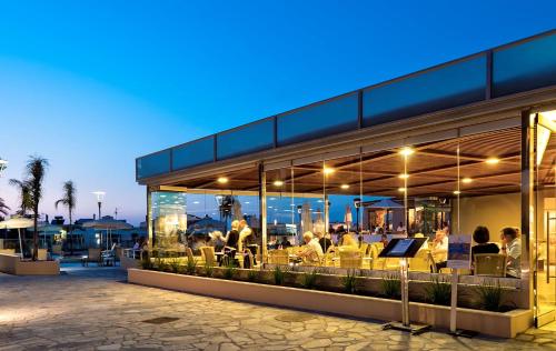Restaurant, Porto Platanias Village Resort in Platanias