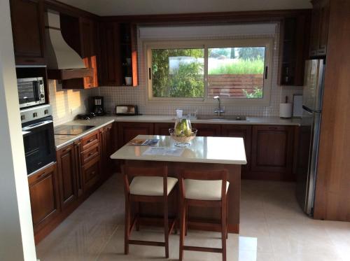 Kitchen, Paradise Latchi Villa in Neokhorio