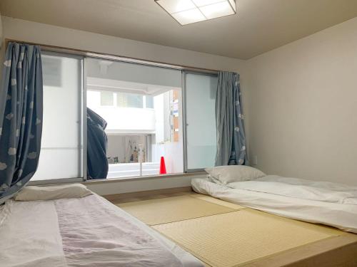 Ikebukuro 11 min walk池袋中心地带#高速无限制网 # 半地下室房间 #1F