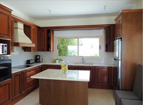 Kitchen, Paradise Latchi Villa in Neokhorio