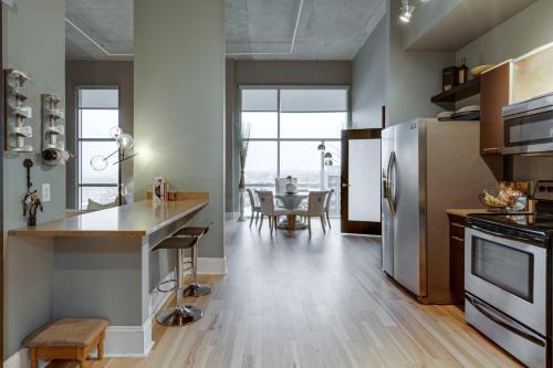 Lux living in this 6th floor condo located in East Nashville minutes to downtown - main image