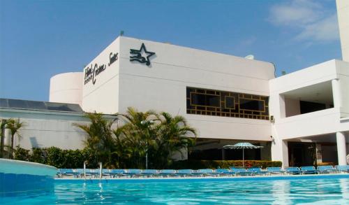 Swimming pool, Hotel Cristina Suites in Puerto La Cruz