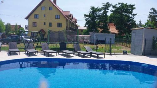 Peldbaseins, Pokoje U Emilii in Katy Rybackie