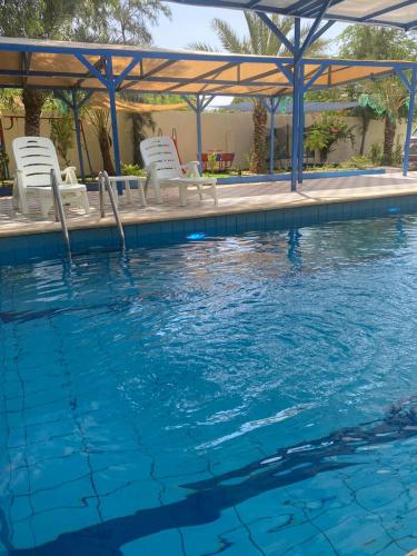 Schwimmbad, villa Rima in Al Rama