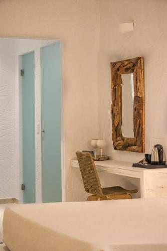 Delfini Beach Hotel & Suites Delfini Beach Hotel & Suites