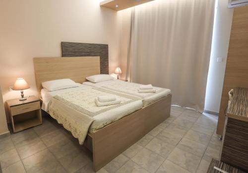 Delfini Beach Hotel & Suites Delfini Beach Hotel & Suites