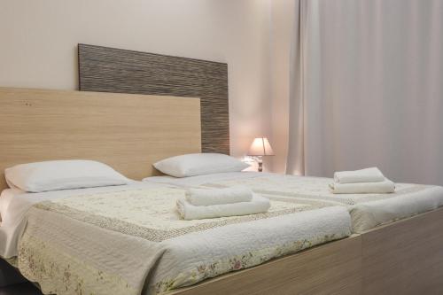 Delfini Beach Hotel & Suites Delfini Beach Hotel & Suites