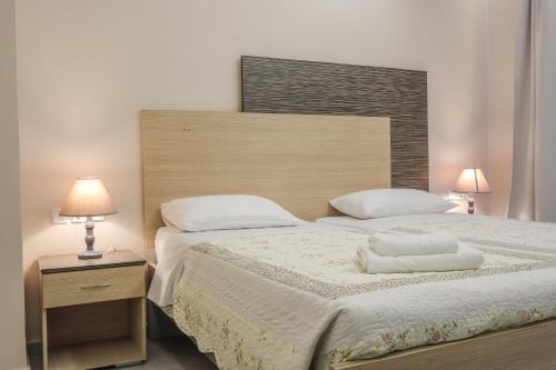 Delfini Beach Hotel & Suites Delfini Beach Hotel & Suites