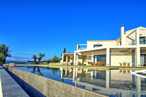 Villa Acropolitana by PosarelliVillas - Location, gîte - Akharavi