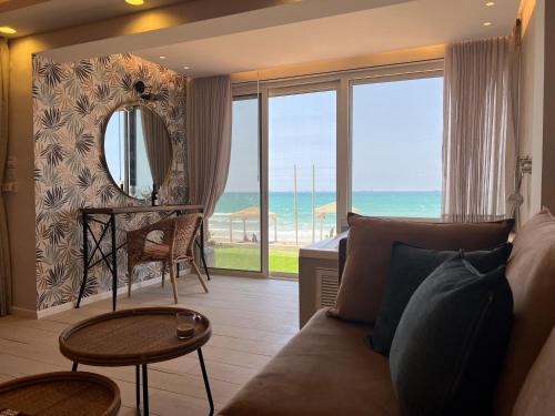 בית חוף מושלם עם גקוזי ומרפסת - Beachside Bliss W jacuzzi, Haifa (fotografie 7)