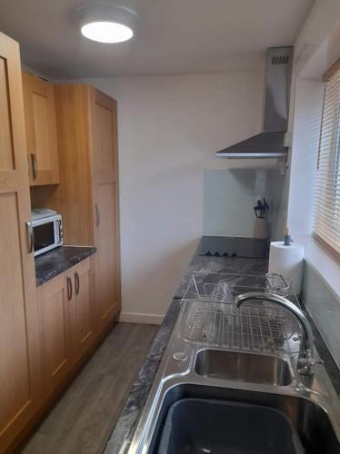 厨房, Three bedroom House with a Magnificent sea view Sandhead Dumfries & Galloway in 桑德海德