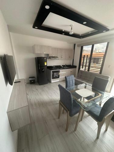 ห้องส่วนกลางสำหรับนั่งเล่น/ดูทีวี, Campiña Stay Apartamento Amoblado (Campina Stay Apartamento Amoblado) in อูร์บานิซาซิออนเลาเรเลส