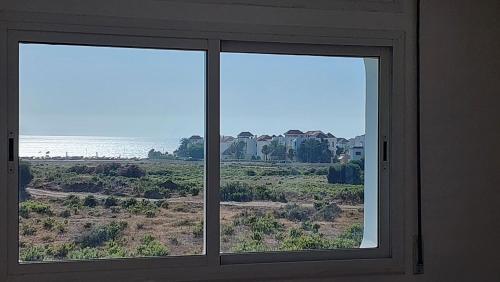 Appartement avec piscines, vue sur mer et accès à la plage à Achakar Hill, Tanger.