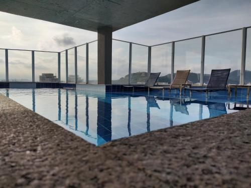 View, Apto Novo, Sofisticado e Aconchegante em Asturias Guaruja in Asturias