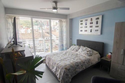 Design Studio Apartment with balcony and view in central and quiet area