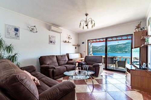 Three-Bedroom Apartment with Terrace and Sea View