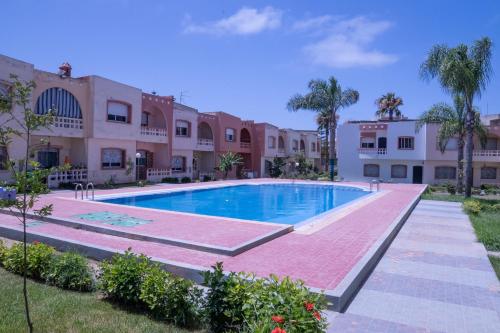 Swimming pool, Duplex La roseraie a 2min de la plage 2 piscines in Sidi Bouzid
