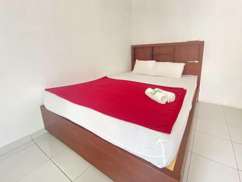 Guest House Hj Muriyah Syariah Slawi Mitra RedDoorz · Procot