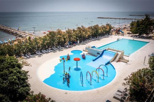  Bungalow in Caorle with garden furniture in Caorle