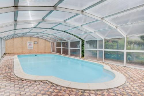 Appartements Le Marigny - Studio avec piscine partagee