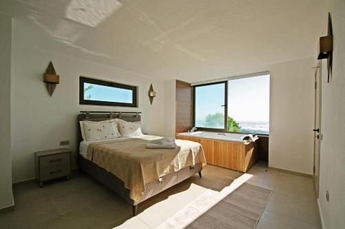 Villa With a Private Heated Pool, Jacuzzi, Overlooking Spectacular Views Of The Sea in Uzumlu