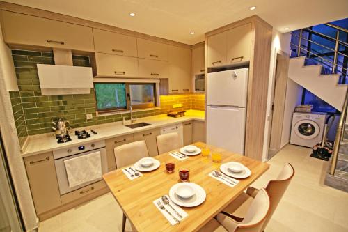 Villa With a Private Heated Pool, Jacuzzi, Overlooking Spectacular Views Of The Sea in Uzumlu