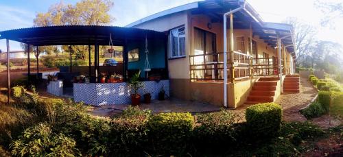 Étterem, Otentik guesthouse in Mbabane