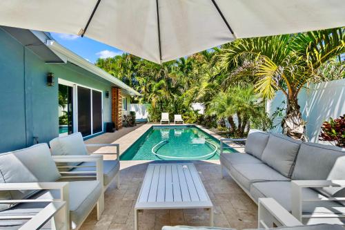 Beach Bliss: 10 Mins to Waves 3BR Oasis with Pool