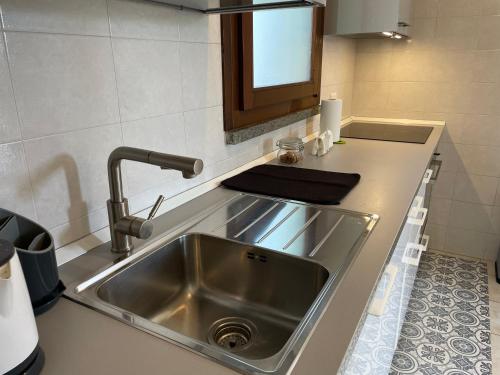 Kitchen, Baggio Boutique Apartment - Affitti Brevi Italia in Bande Nere