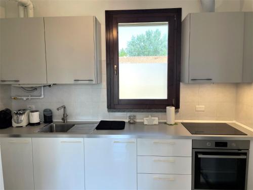 Kitchen, Baggio Boutique Apartment - Affitti Brevi Italia in Bande Nere