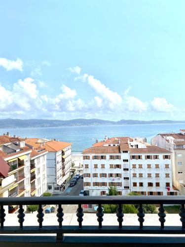 Apartamento en Sanxenxo. Ático con vistas al mar. - Sangenjo