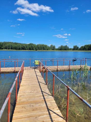 Leśny dworek - pokoje nad jeziorem - Hotel - Koczała