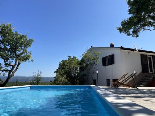 House with 3 bedrooms in Poljica with wonderful mountain view furnished garden and WiFi 15 km from the beach