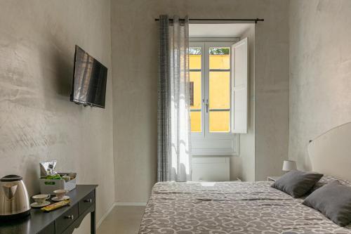 Flower Rooms Cagliari Room Type - Deluxe Double Room with Extra Bed Flower Rooms Cagliari Room Type - Deluxe Double Room with Extra Bed