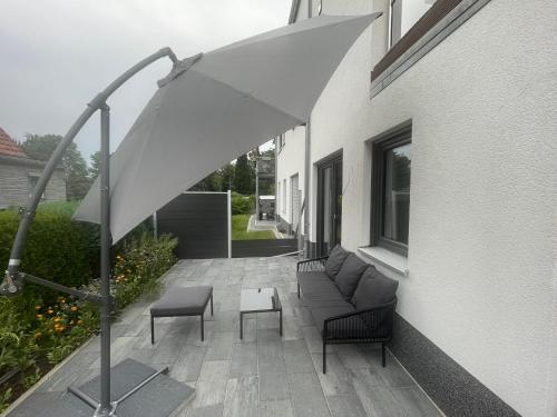 Erkély/terasz, Modernes und helles Mini-Haus in Peine in Peine