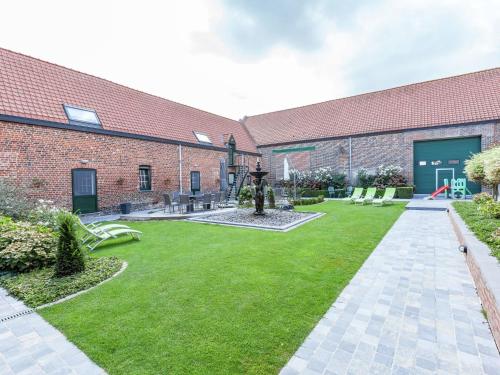 Large cottage overlooking the sunny courtyard with fountain